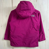 The North Face Scoop Jacket, size 120, purple, kids' size. This nylon hardshell jacket is a perfect outerwear top. Product code: z00054219.
