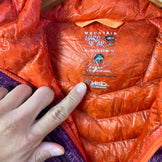 Mountain Hardwear Ghost Whisperer Hooded Down Jacket, Women's Size Small, Purple. This down jacket features down insulation and is perfect for outerwear. (Product code: z00053756)