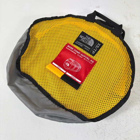 【Unisex OneSize イエロー系】 The North Face ( ザ・ノースフェイス ) ベースキャンプ ダッフル XS BC Duffel XS 28L TPEファブリックラミネート 収納用メッシュバッグ付属 ポリエステル バッグ ストレージ ダッフルバッグ ボス
