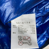 北面轻盈保暖羽绒服，男款M码，蓝色。这款羽绒服采用羽绒填充，是理想的外套之选。（产品代码：z00054532）