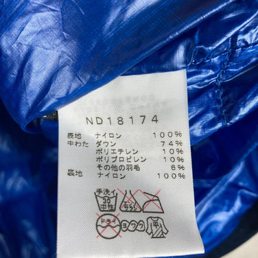 北面轻盈保暖羽绒服，男款M码，蓝色。这款羽绒服采用羽绒填充，是理想的外套之选。（产品代码：z00054532）