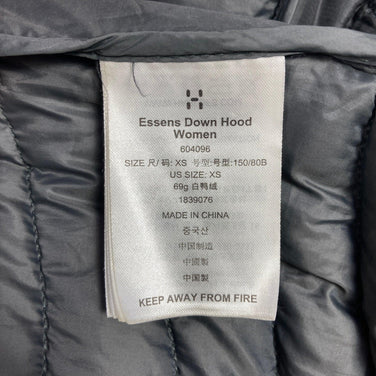 Haglofs Essence 羽绒连帽衫，女款 XS 码，黑色。这款羽绒服既可作为上衣，也可作为外套。产品编号：z00053490。