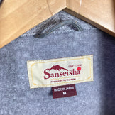 Sanseisha 男士中灰色 Caravan 针织抓绒背心。这款涤纶抓绒背心是任何造型的完美搭配。产品代码：z00054614。