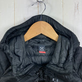 Haglofs Essence 羽绒连帽衫，女款 XS 码，黑色。这款羽绒服既可作为上衣，也可作为外套。产品编号：z00053490。