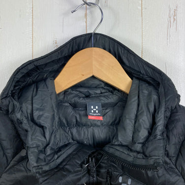 Haglofs Essence 羽绒连帽衫，女款 XS 码，黑色。这款羽绒服既可作为上衣，也可作为外套。产品编号：z00053490。