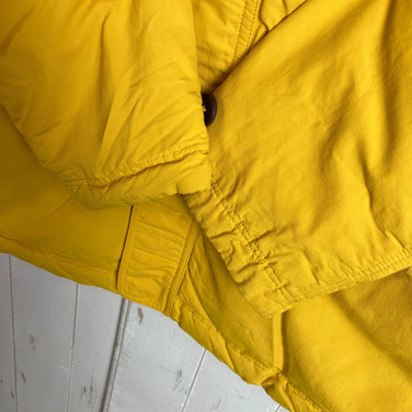 Montbell Down Husky Coat, Kids' Size 150, Yellow. This down jacket is a perfect outerwear piece with down insulation. Product code: z00053935.